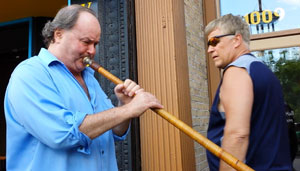 8/16/2014 Milwaukee, WI Sigmund Snopek playing an Alpine horn at The Old German Bier House